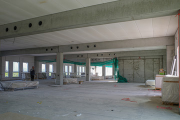 on  construction site the interior finishing of a factory building takes place