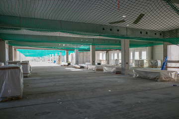 on  construction site the interior finishing of a factory building takes place