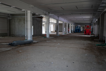 on  construction site the interior finishing of a factory building takes place