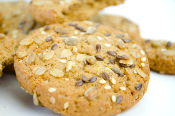 Cereal cookies with seeds and nuts close up. Healthy food, gluten free diet