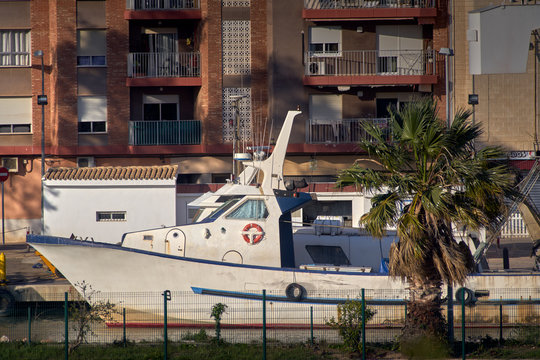 Old fishing boat moored in cyti port.