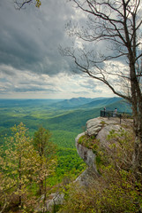 Obraz na płótnie Canvas A view of the overlook on top of Caesar's Head mountain in Greenville county, South Carolina on a cloudy day.