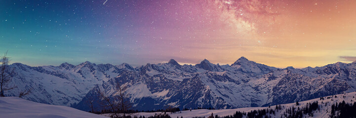 Snowy rocky mountain with a beautiful starry night, space fort text