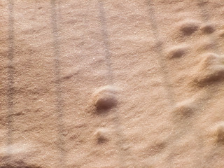 Shadows and  patterns on  the surface of snow