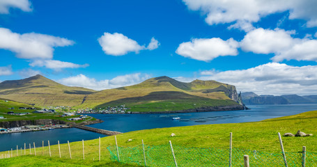 Sandavagur town with fish farms, Witch's Finger