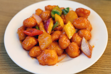 Sweet orange chicken and veggies served. in Din Tai Fung restaurant of Mall of the Emirates in Dubai UAE, December 2019. Healthy, delicious and fresh asian food offering good value for money.