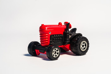 Fototapeta premium miniature figure concept of tractor