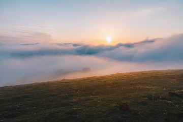 Old, misty, and, a foggy mountain village at sunset
