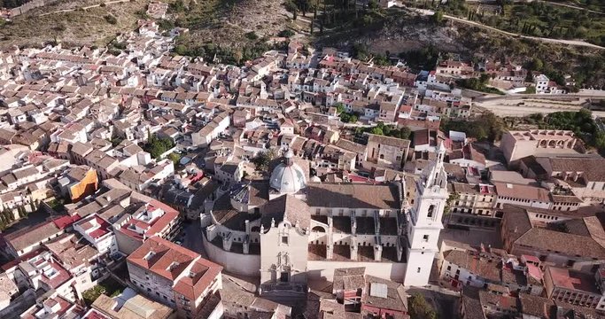 Aerial panoramic view of Xativa cityscape with Collegiate Basilica of Santa Maria, Spain