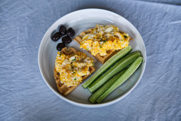 Homemade Paleo, Gluten Free and Sugar Free Healthy Waffles served with Scrambled Eggs