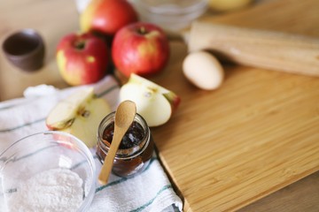 Apple pie. Traditional  apple pie with fresh apples and cinnamon. Ingredients on the table. Cake...