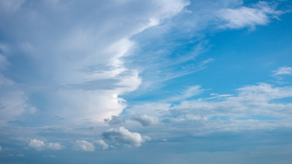 Naklejka na ściany i meble Bright blue sky with cumulus clouds beautiful landscape