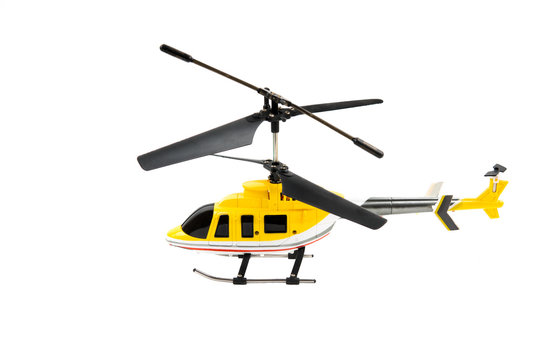 Closeup of a small remote controlled toy helicopter isolated on white.