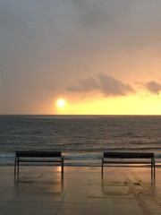 Fototapeta na wymiar Scenic View Of Calm Sea At Sunset