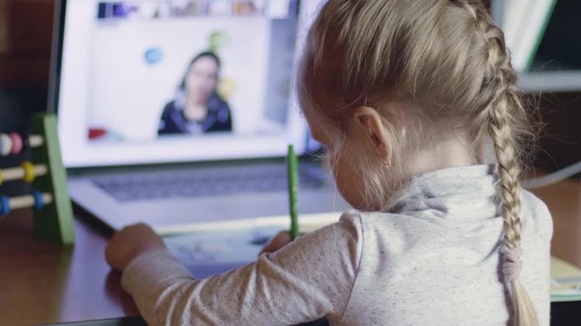 Girl Learning Remotely At Home
