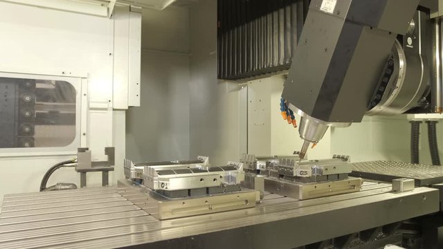 Automatic machine for the exact processing of expensive metal objects

