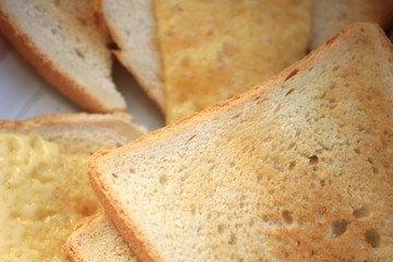 Several pieces of bread with cheese