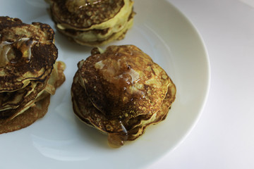 Pancakes on a white plate