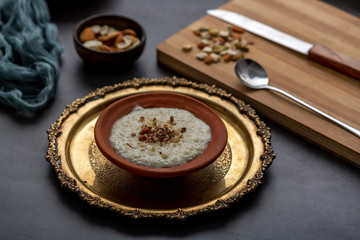 Phirni, a traditional and delicious indian style milk and rice based creamy dessert, served in clay pot