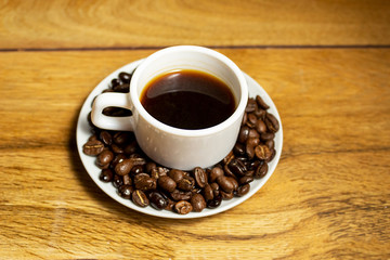 cup of coffee on a wood