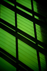 Abstract green background. Black stripes