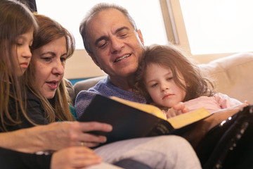 Family Reading the Bible together