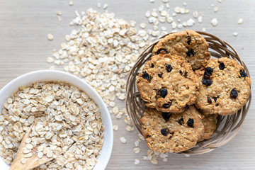 Top view cookies in a wicker basket, background.