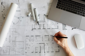Architect working on construction plan