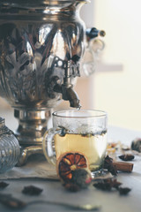 Tula samovar with tea, bagels and flowers