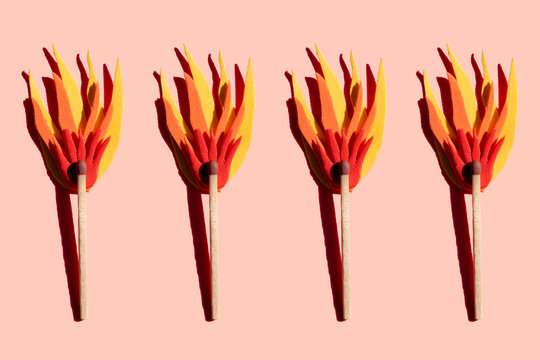 Studio shot of row of matches with fake flames
