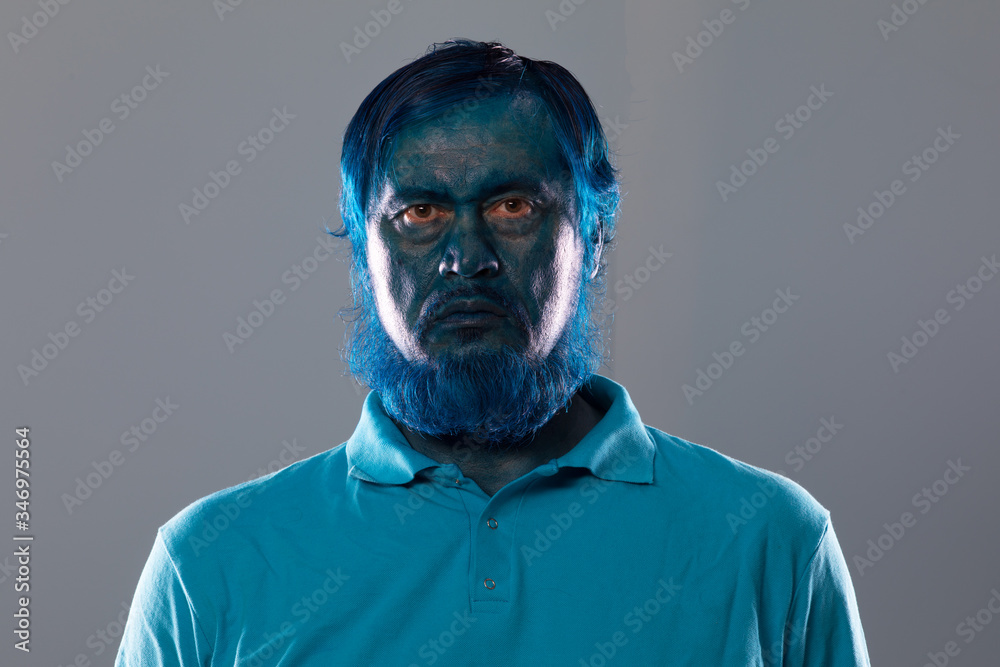 Sticker portrait of a painted blue man with a blue beard