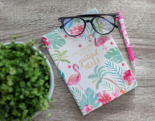 Notebook with glasses 