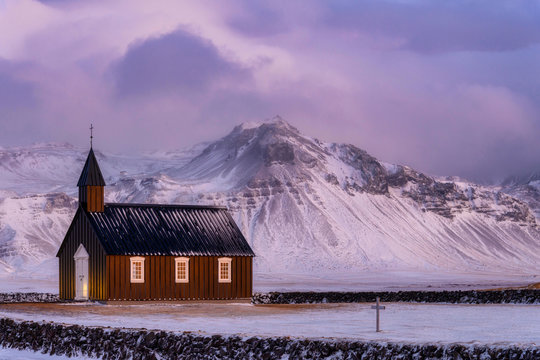 Iceland, Budir, Budakirkja church at winter dusk