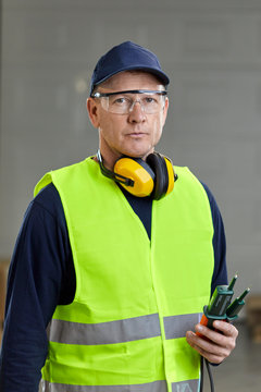 Portrait of worker in protective workwear