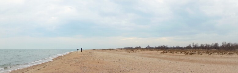 Deserted sandy beach and sea