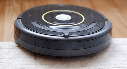 close up of a old vacuum cleaner robot