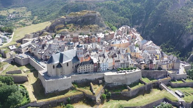Aerial view of medieval fortified city of Briancon with impressive citadel on hill, France