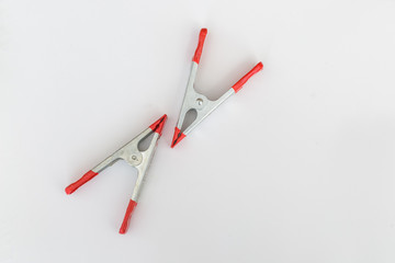 Two A-clamps on white background.