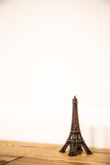 Paris statuette on white background