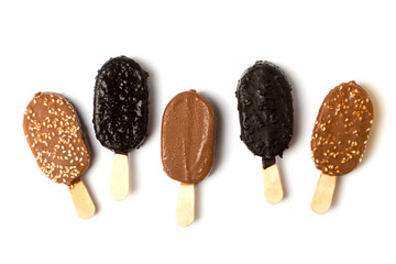 chocolate ice cream on a stick on a white background