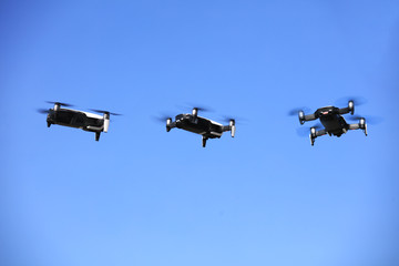 Drone flying on sky 