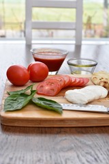 Pizza ingredients ready for making an easy home made dinner with  home delivered meal kit