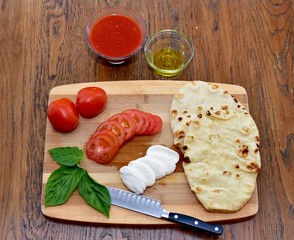 Pizza ingredients ready for making an easy home made dinner with  home delivered meal kit