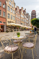 Cozy outdoor cafe in Gdansk old town, Poland.