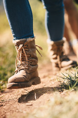 A close up of hikers walking