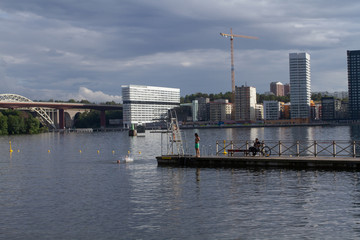 Naklejka premium Swedish harbor During the day, reflections can be seen on the surface