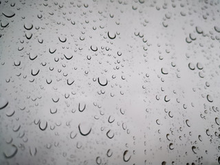 Lots of rain drops on the glass
