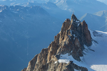 Aiguille du Midi from Mont-blanc du Tacul in the evening light in the French Alps, Chamonix...