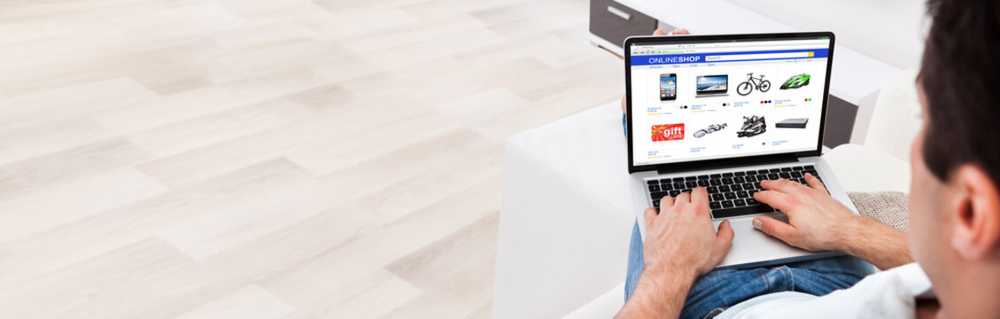 Man Shopping Online - Powered by Adobe