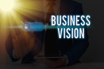 Writing note showing Business Vision. Business concept for grow your business in the future based on your goals © A